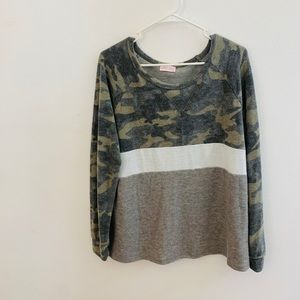 Soft long sleeve camo print shirt. Never worn.